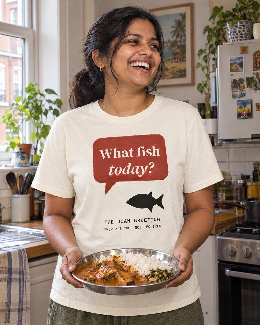 Lifestyle image (AI-generated illustration): woman wearing the What Fish Today? Tee in Natural Raw, holding fish curry and rice